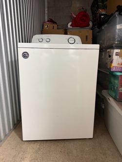 Washer and Dryer. Samsung. Amana. Top loader washer. Side loader dryer.