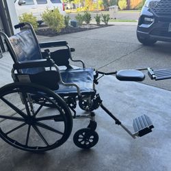 Wheelchair With Adjustable Leg Rests 