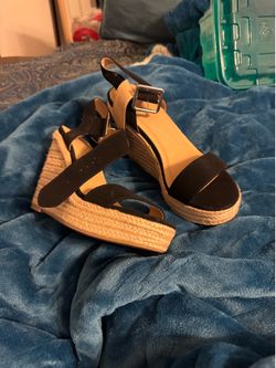 Black wedge heels size 8.5