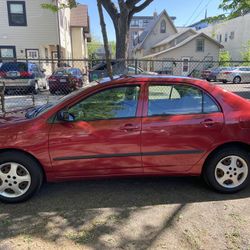 Red Toyata Corolla 2006