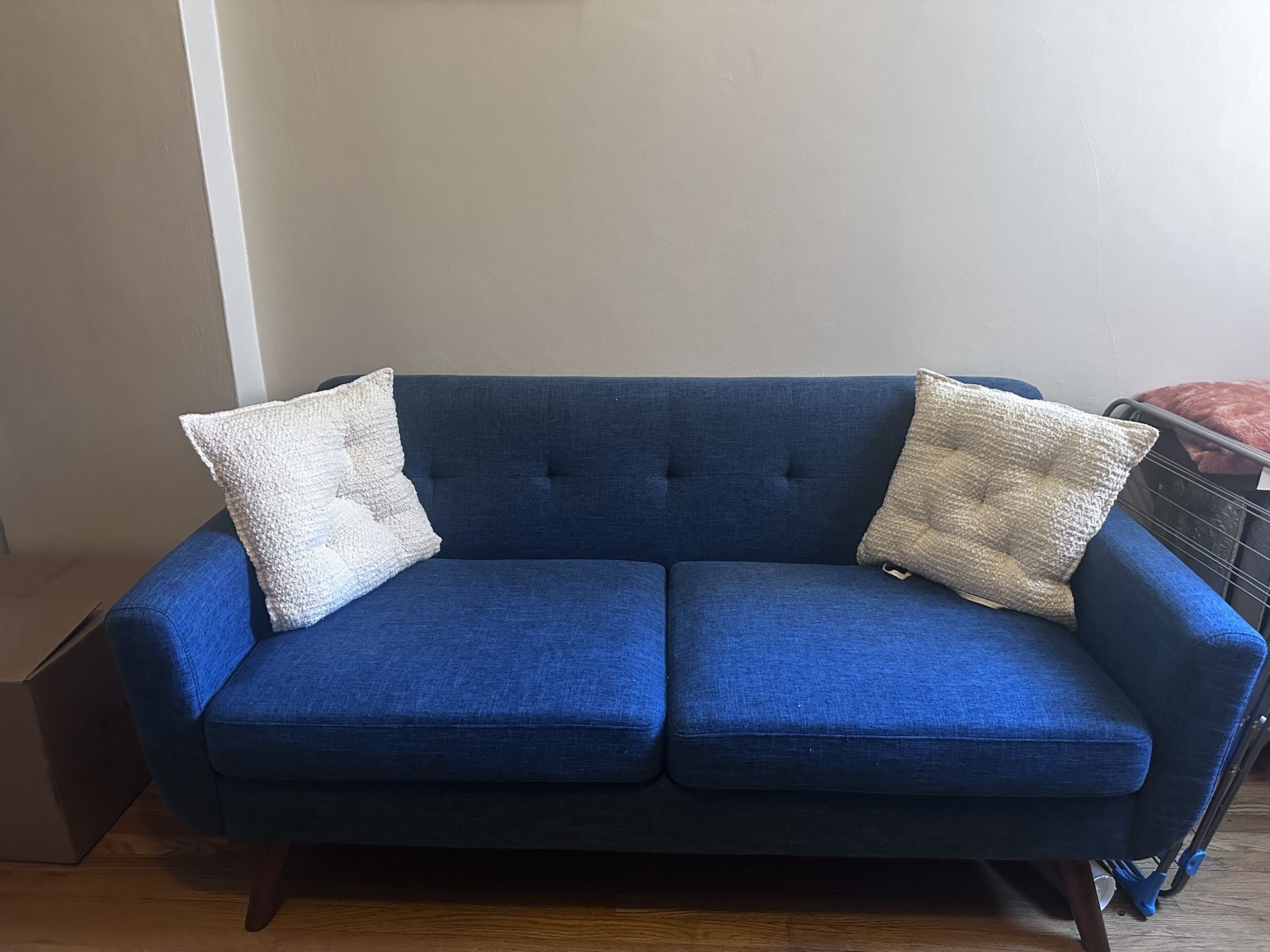 Multiple pieces of furniture for sale.