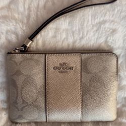 Coach Platinum/Silver Coated Canvas Small Wristlet w/zipper and wristlet strap