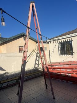 Escalera de 14 pies de fibra de vidrio casi nueva