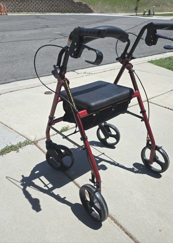Four-wheel rollator walker