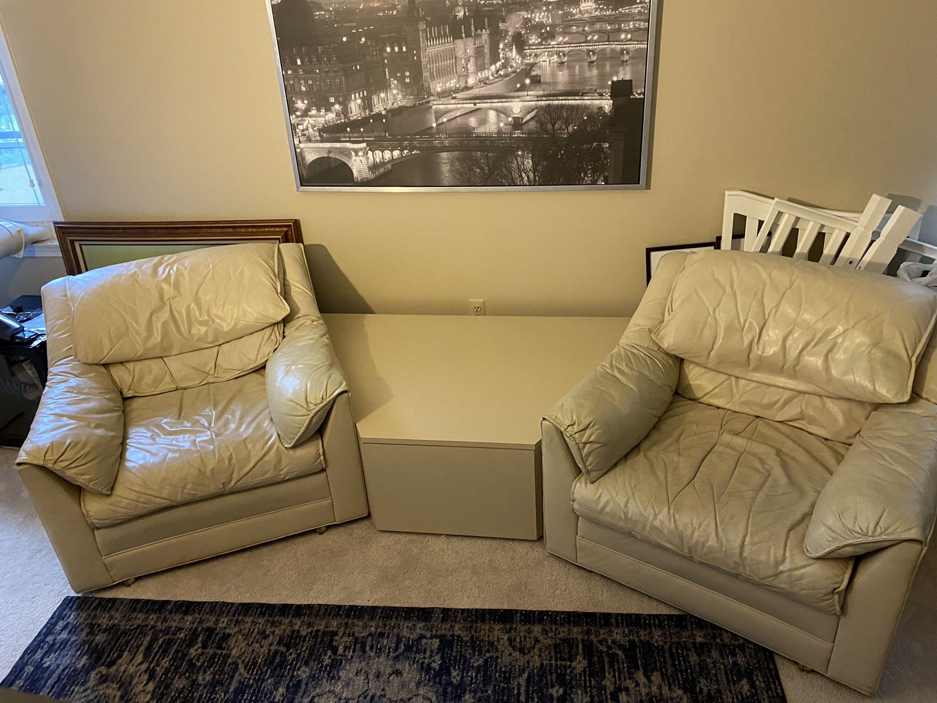 Two Chairs And Center Table