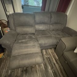 Grey reclining couch