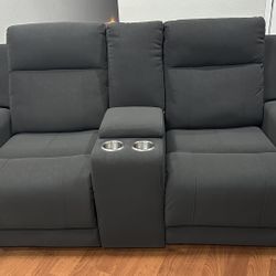 New Upholstered Motion Reclining Loveseat. 