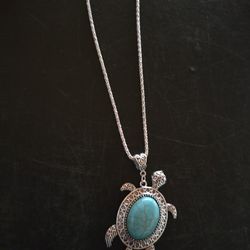 Heather and Bumble

Silver & Blue Turtle Necklace