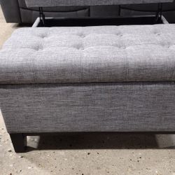 gray tuffted storage ottoman (New)