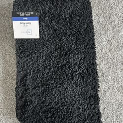 2 New bath mats, dimensions in the photo, both for $10!