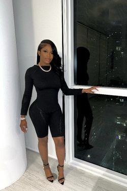 black long-sleeve romper
