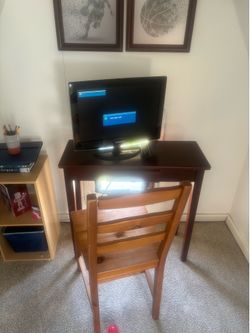 Tv stand, tv and chair