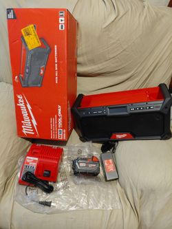 New $200 Milwaukee m18  job site radio kit charger  and 5.0 battery  cash serious buyer  check distance before buying $200 if only radio $130