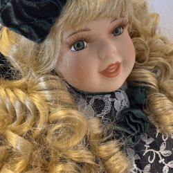 Vintage Porcelain Doll Blonde Curly Hair Green Velvet Dress on Chair Collectible