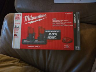 2 Milwaukee m12 high output xc5.0 batteries and charger 48-59-2450p