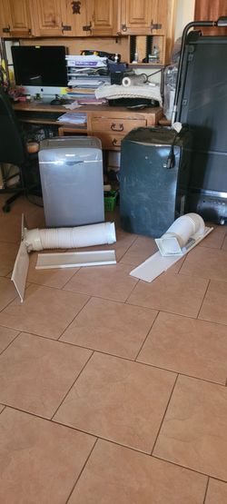2 Air Conditioners, working well, 14,000 BTU.