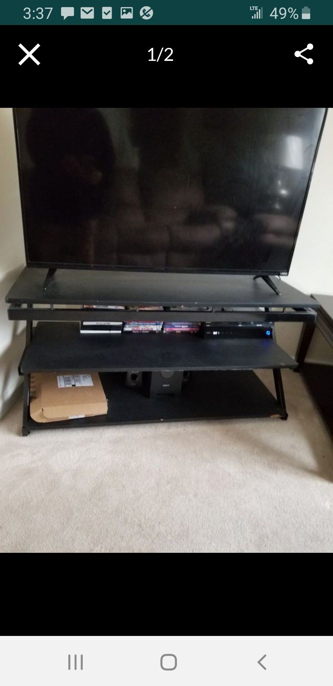 Used 3 shelve entertainment center tv not included