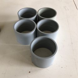 Five 4” PVC  Conduit Couplings