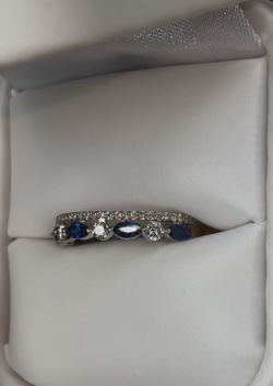 Sapphire and diamond engagement style ring