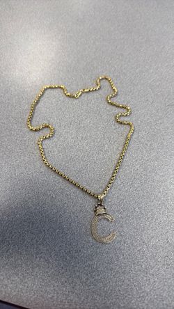14k gold chain nd 10k gold pendant