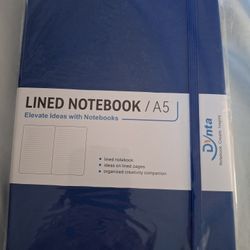 Elevate your ideas with this blue lined notebook by Dynta. Perfect for organized creativity.