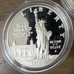 1986 Silver Dollar “Statue Of Liberty-Ellis Island”