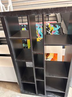 black IKEA KALLAX shelf unit