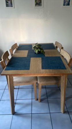 Brand new table and chairs in box