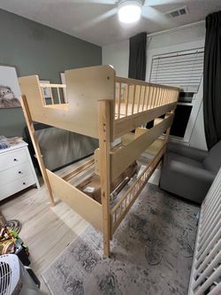Wood bunk bed with storage shelf