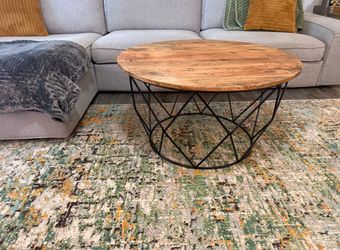 Round wood coffee table