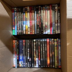 Box Of 50 DVDs  In Good Condition 