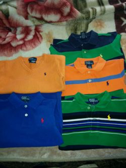 Great condition 4 ralph lauren polo boys short sleeve shirt and one v-neck sweater asking $45 for all