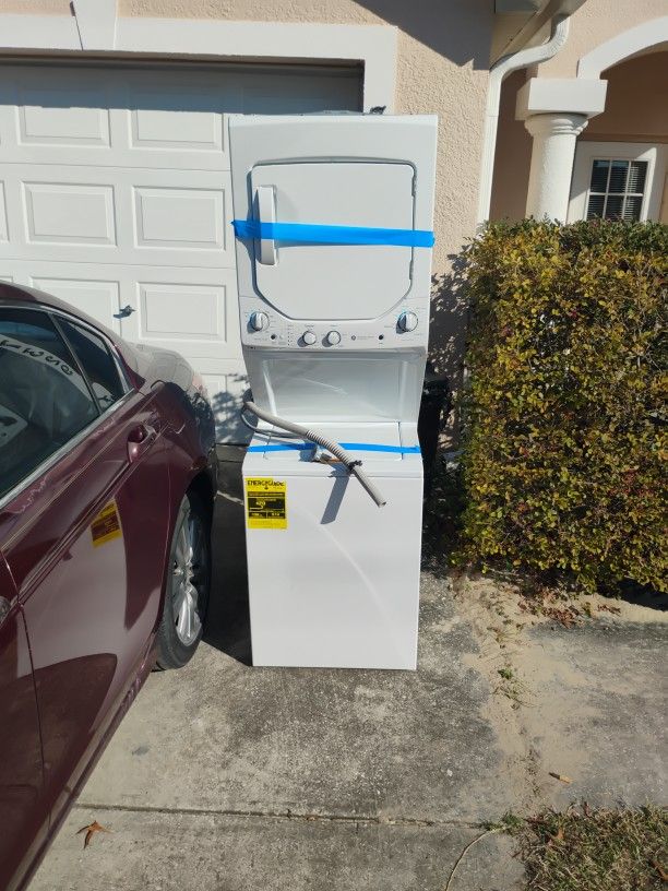 Brand New GE Washer And Dryer One Piece.