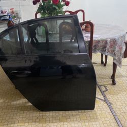 Puerta Trasera Pasajero