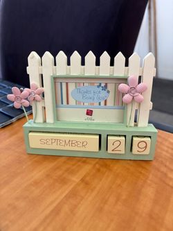 Nice Picture frame with calendar. See pictures for more details.