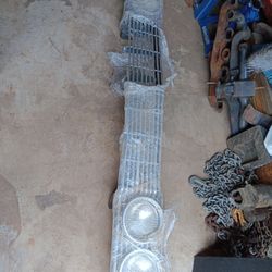 64 Chevy Impala Grill And Brackets And Head Light Buckets