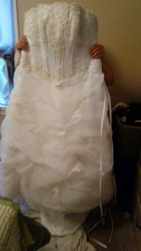 Wedding dress needs clean but its perfect size 14-16
