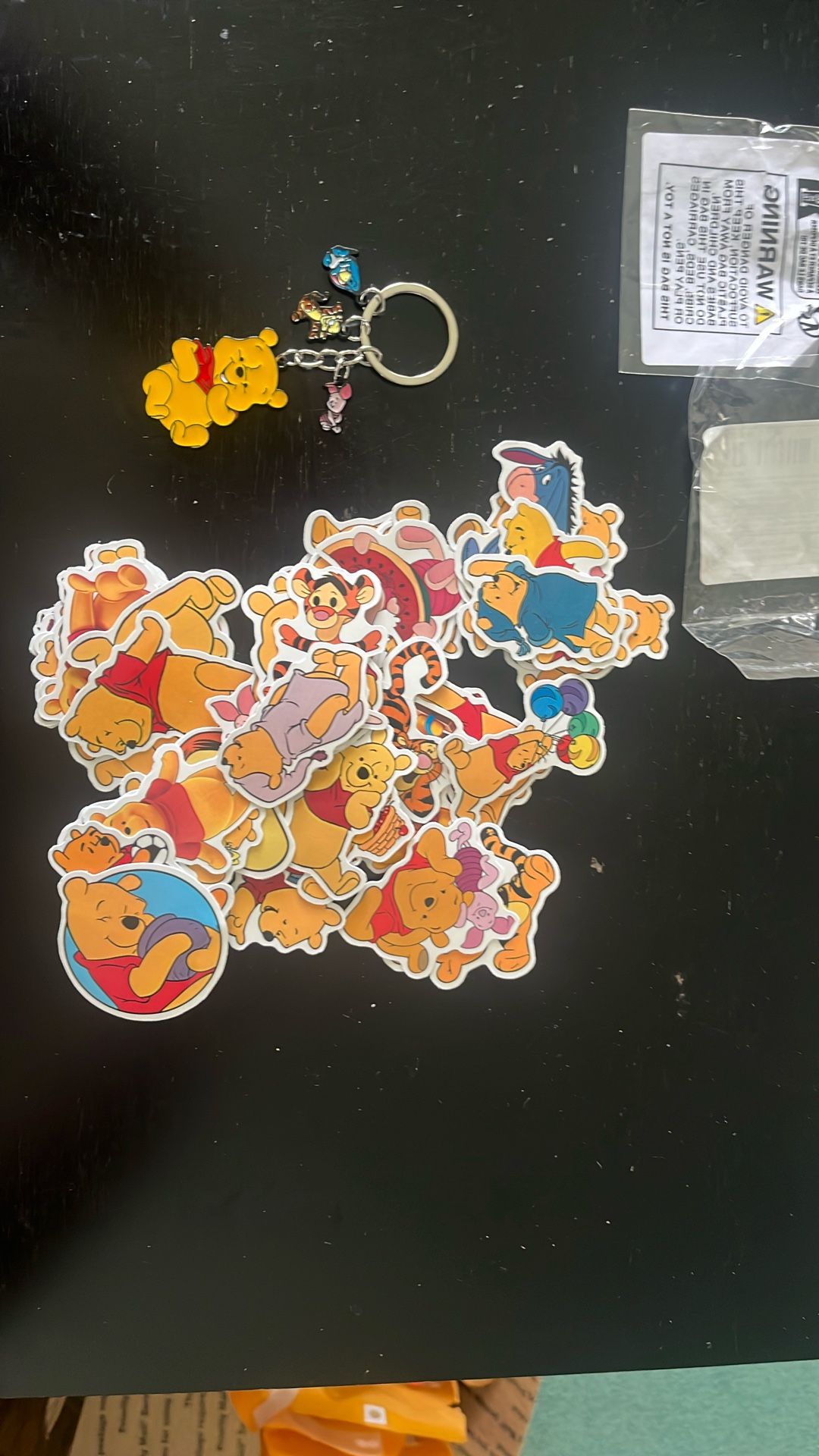 new winnie the pooh keychain and 50 stickers