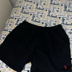 medium black polo shorts