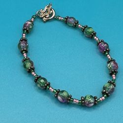Handmade Multicolored Glass Beads Pinks & Greens With Silver Spacers 6 1/2” Toggle Closure Good Condition