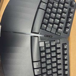 Perixx PERIBOARD-613 wireless mini membrane ergonomic split keyboard.  