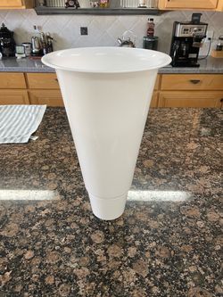White plastic flower bucket