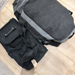 2 Rolling Duffle Bags 