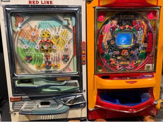 2 Vintage Japanese pachinko machines.
