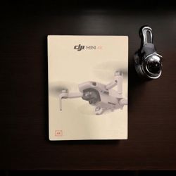 6582546 DJI mini 4k drone with remote control Floor Model