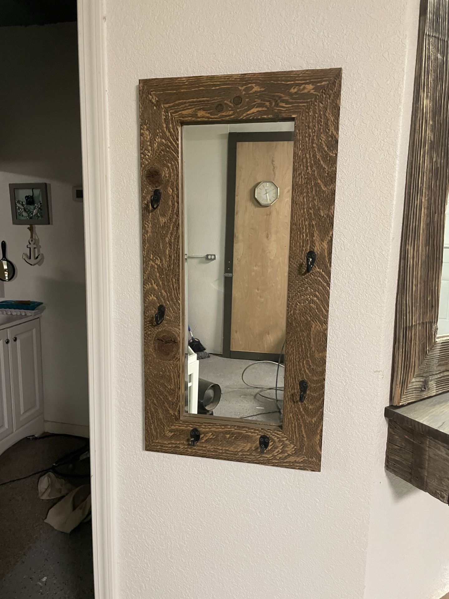 Hallway mirror with hooks