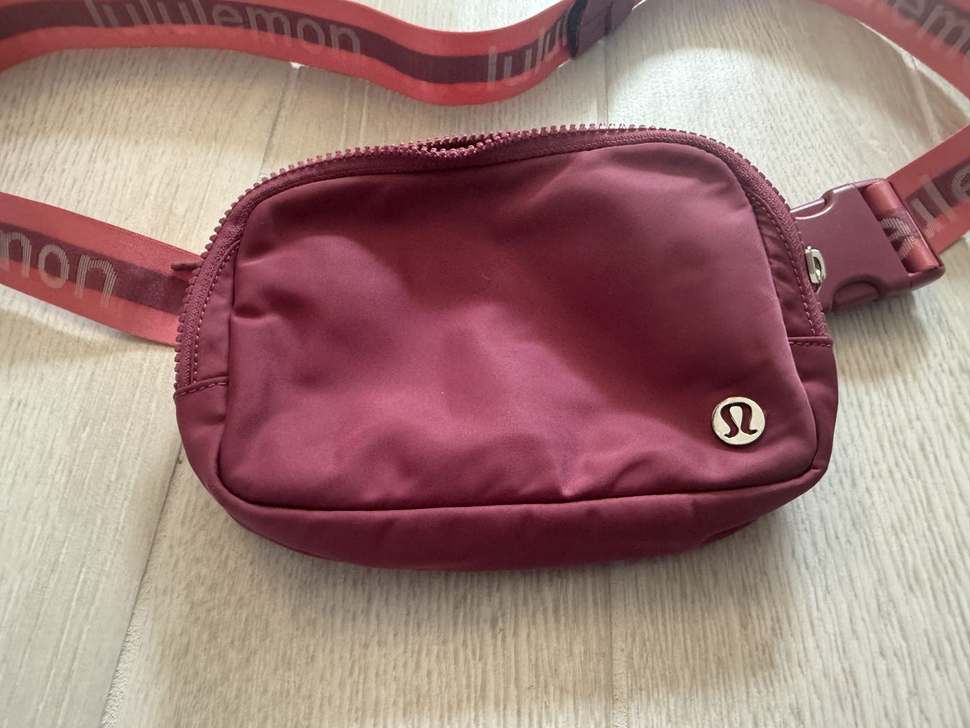 Great Condition Lululemon Everywhere Belt Bag 1L Word mark Limited Color Pink