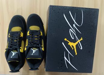 Yellow thunder Jordan 4s