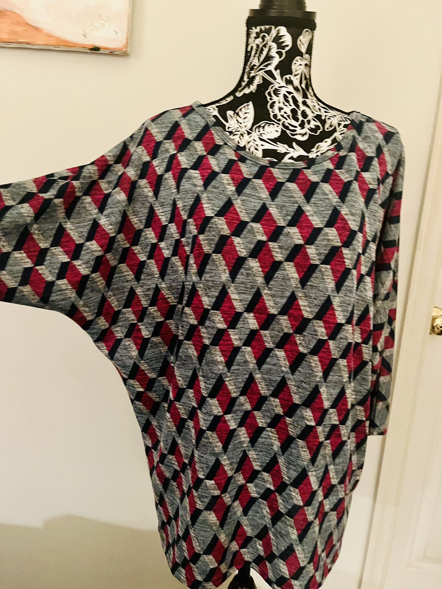 1X tunic top for woman. 3/4 sleeve. New with tags. Very soft 97%polyester 3% spandex. Comes from a smoke free environment.  