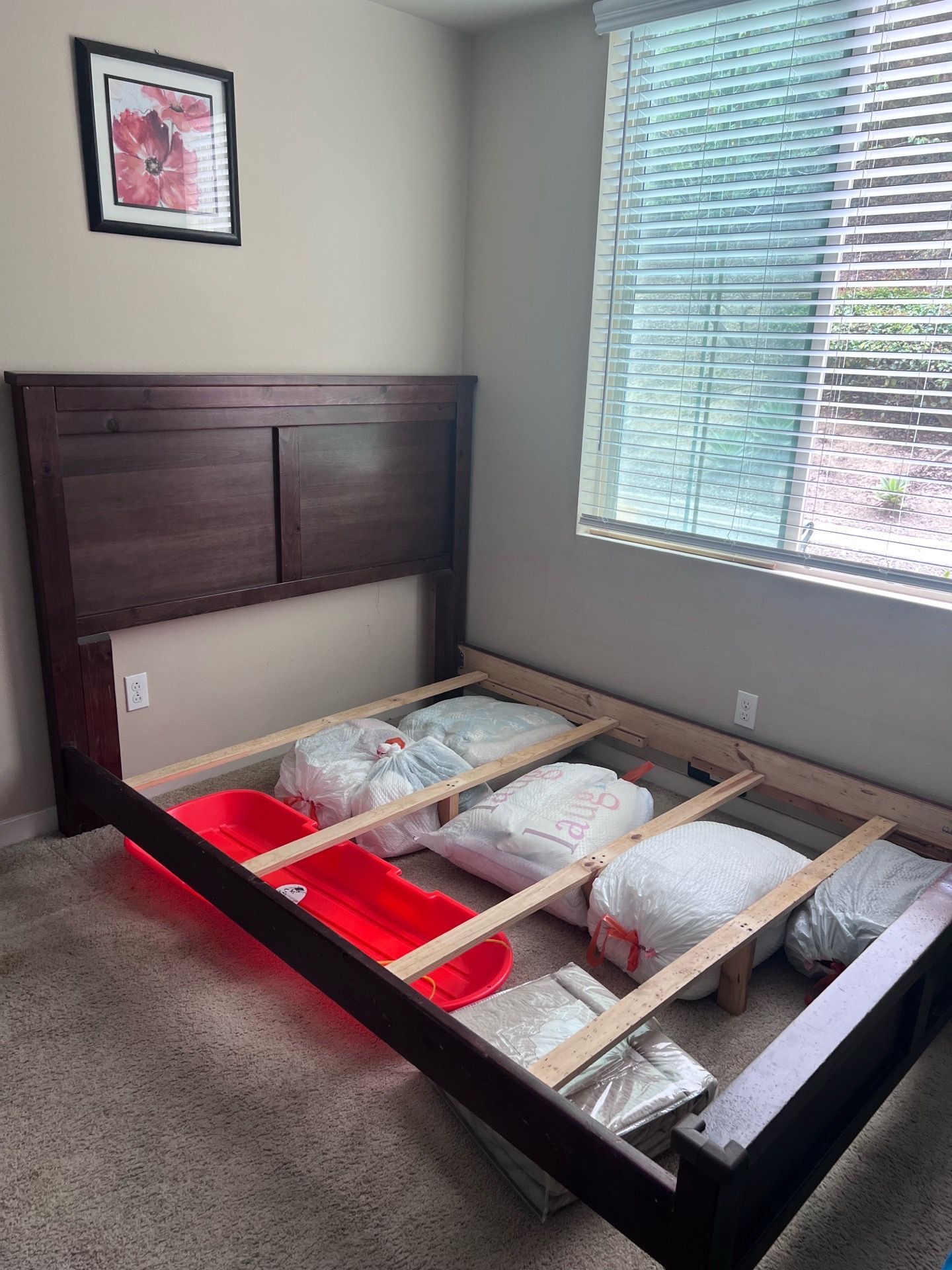 Solid wood bed frame, box spring, and mattress included.